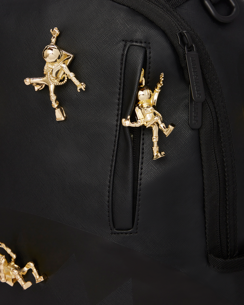 THE LOST IN SPACE BACKPACK (10 3D GOLD METAL ASTRONAUTS)