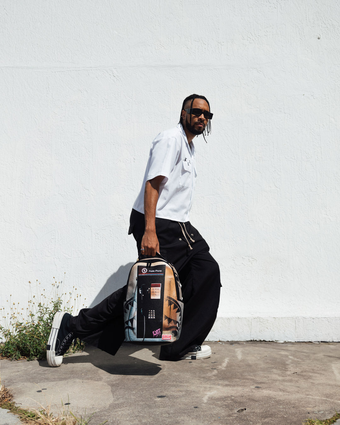 EXIT NYC PAYPHONE BACKPACK