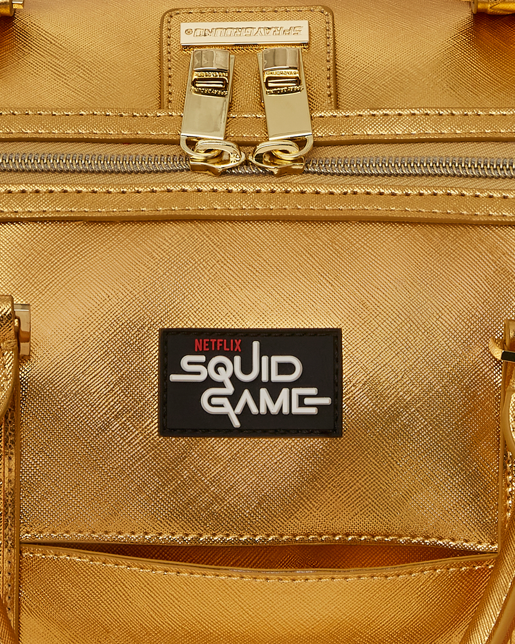 SQUID GAME COLLAB PIGGY BANK DUFFLE