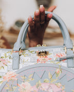 A.I. AFRICAN INTELLIGENCE ELEGANT ENERGY MINI DUFFLE - SANDFLOWER COLLAB